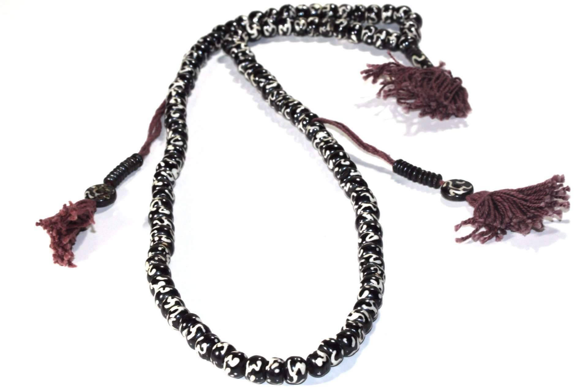 Silver Hestia Buddha Om Meditation Prayer Mala with religious beads and pendant, used for prayer and meditation practices.