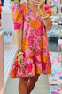 Pink floral bubble sleeve V-neck ruffled mini dress by Carmine Juneberry, featuring a feminine design with floral pattern and ruffle details.