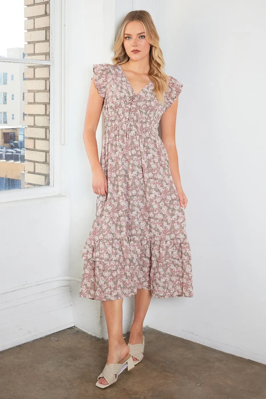 Colorful flower print ruffle cap sleeve V-neck midi dress by Jade Icarus, featuring a stylish floral pattern and feminine design.