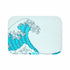 Yellow Pandora Waves bath mat with a wavy design, made of soft, absorbent material for bathroom comfort and safety.