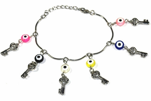 Silver Hestia Age Old Charms bracelet with intricate silver charms and adjustable chain on a neutral background.