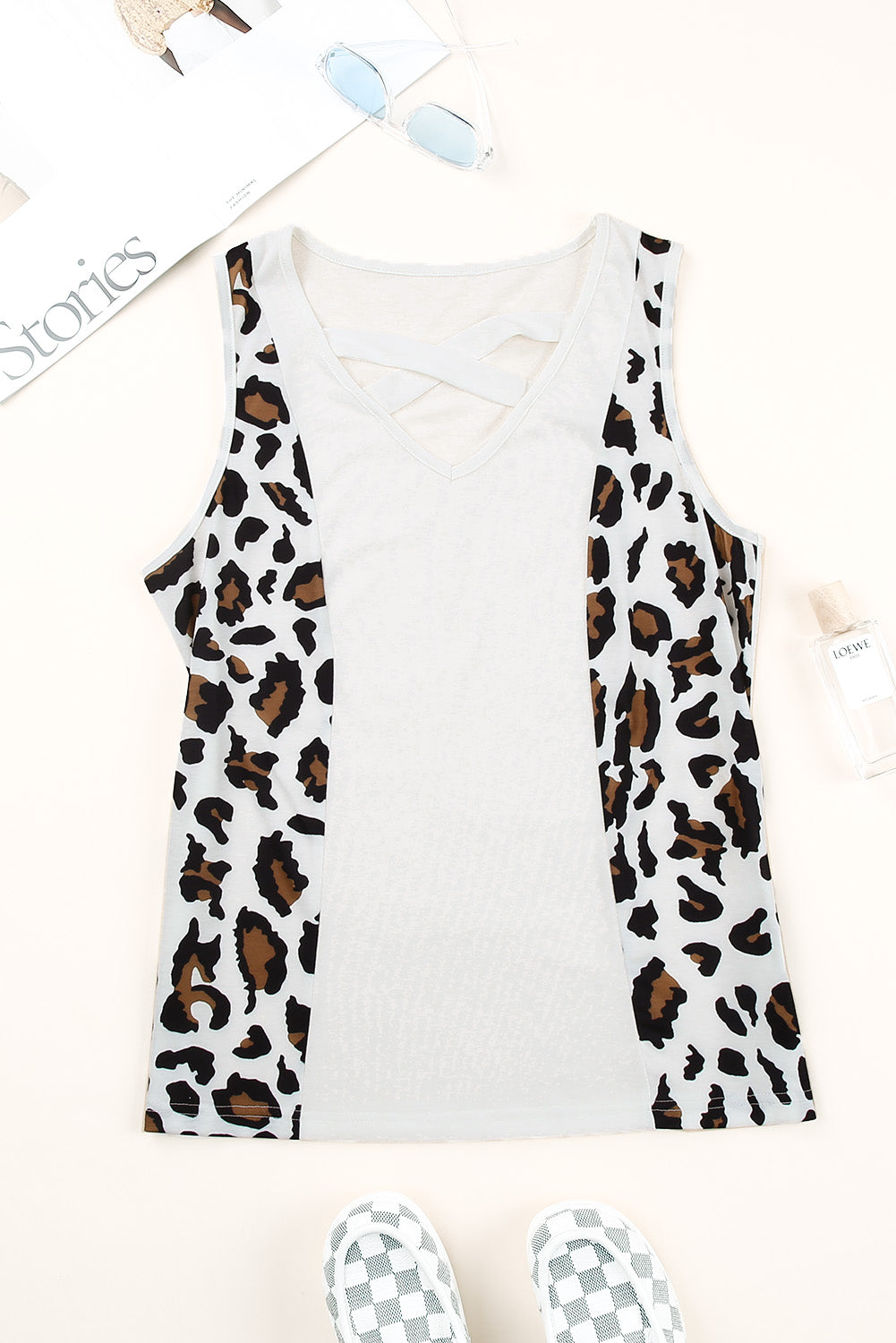 Harlequin Daisy leopard splicing tank top with crisscross design, perfect for bath and beauty wear, shown in black and brown pattern.