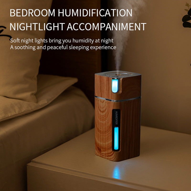 Maroon Asteria ultrasonic air humidifier with LED lights, USB mini mist maker for home improvement, showing mist and light effects