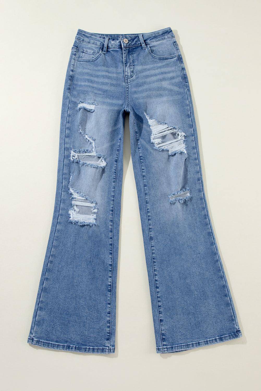 Ashleigh Blue Acid Wash Distressed Wide Leg High Waist Jeans by Carmine Juneberry, showing distressed details and high waist fit.