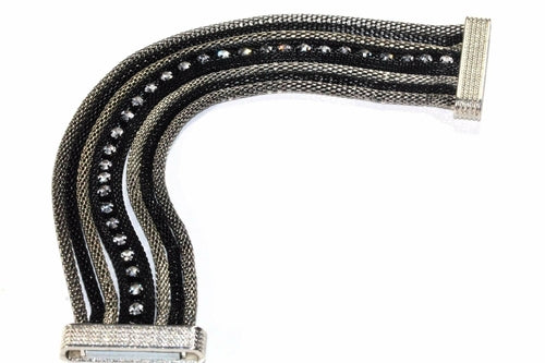 Silver Hestia rope style dazzling cocktail bracelet with intricate chain links and sparkling accents, stylish jewelry for special occasions.