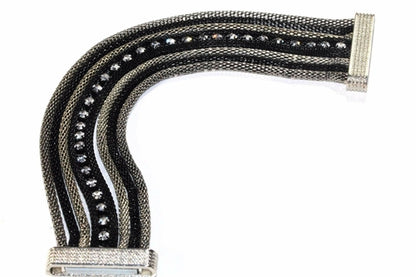 Silver Hestia rope style dazzling cocktail bracelet with intricate chain links and sparkling accents, stylish jewelry for special occasions.
