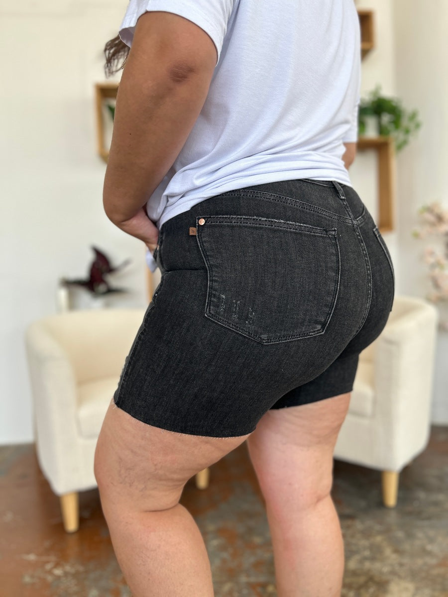 Judy Blue high waist rigid magic denim shorts for women, featuring a fitted style and classic denim texture.