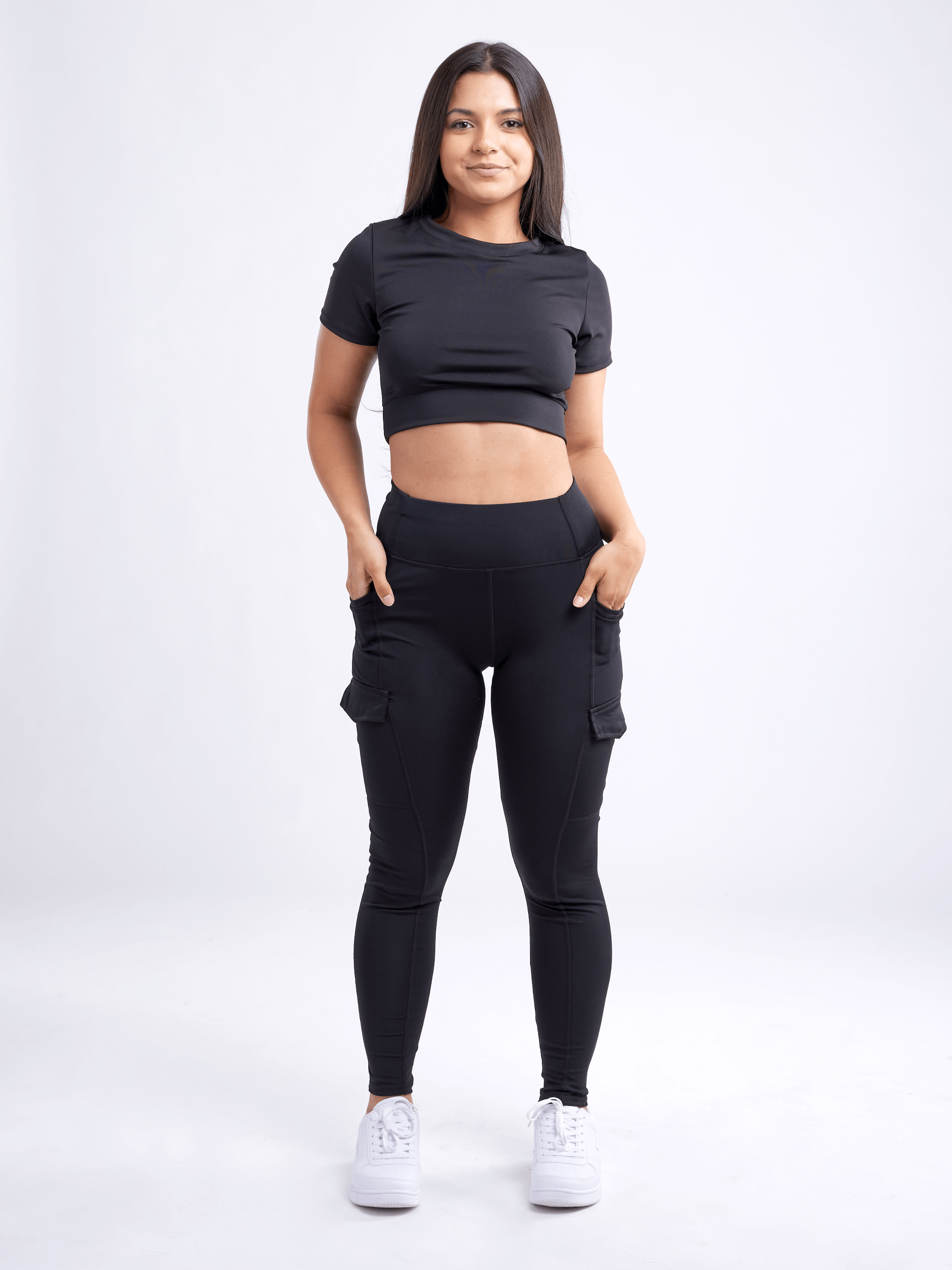 Black Lavender JupiterGear short-sleeve crop top, activewear with a fitted design and breathable fabric, shown on a model.