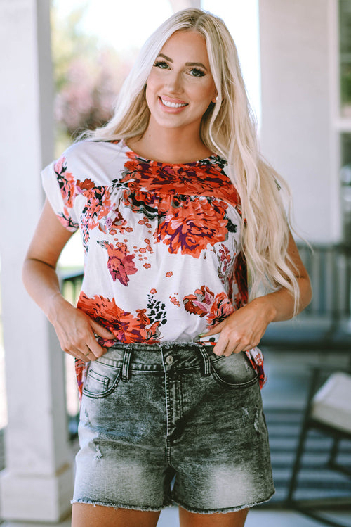 Fiery red floral short sleeve round neck blouse from Carmine Juneberry, showcasing a vibrant floral pattern and relaxed fit.