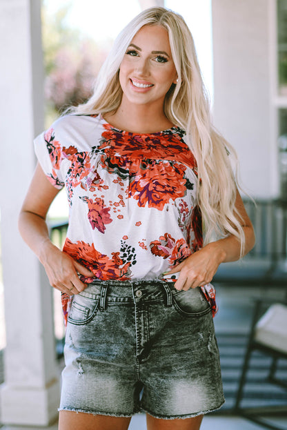 Fiery red floral short sleeve round neck blouse from Carmine Juneberry, showcasing a vibrant floral pattern and relaxed fit.