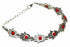 Silver Hestia Hamsa hands and vibrant bead bracelet with colorful beads and intricate silver details.