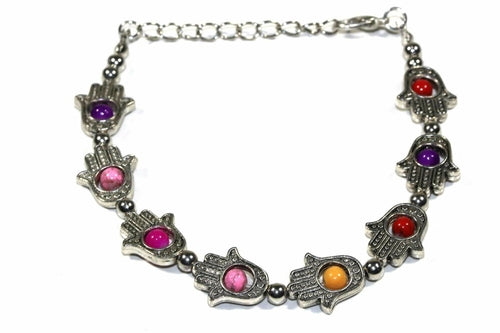 Silver Hestia Hamsa Hands and vibrant bead bracelet featuring colorful beads and intricate silver charms.