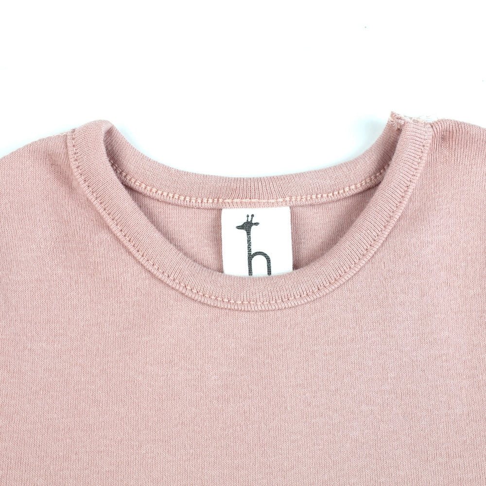 Organic cotton baby toddler pajama set with flat seams by Amber Erebus, featuring soft, high-tension fabric for comfort.