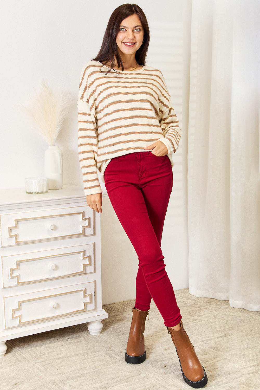 Pear Daisy Double Take striped boat neck sweater in soft fabric, featuring bold horizontal stripes and a cozy, casual fit.