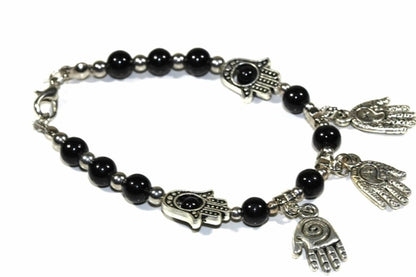 Silver Hestia Hand of Fatima beaded charm bracelet with intricate beads and detailed Hand of Fatima pendant.