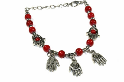 Silver Hestia Hand of Fatima beaded charm bracelet with intricate beads and detailed Hand of Fatima pendant on a delicate chain.
