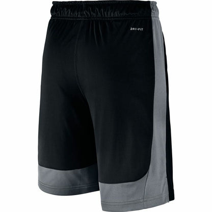 Black children’s Nike sports shorts with elastic waistband and Nike logo, ideal for active outdoor play and sports activities.