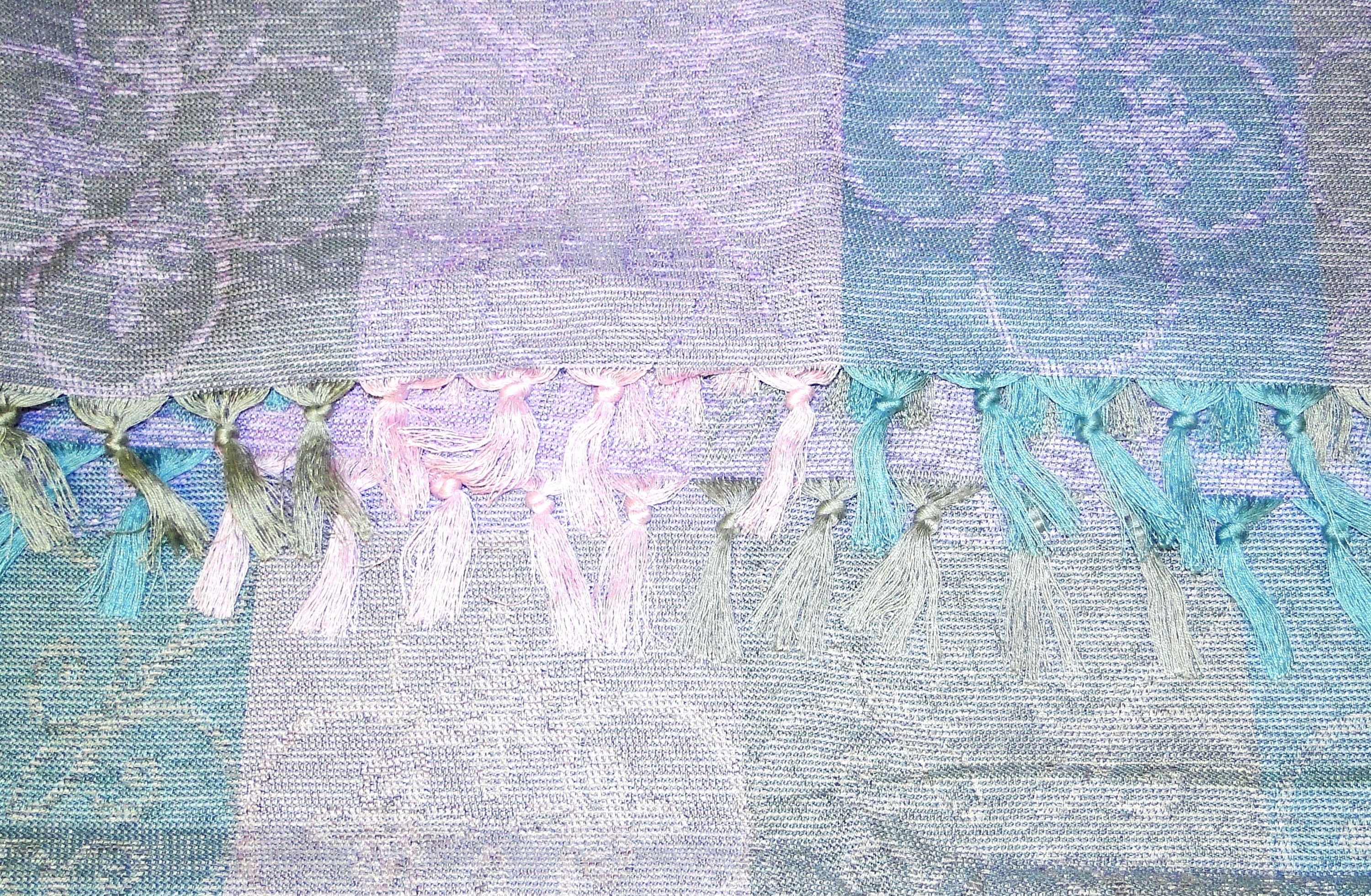 Amethyst Tiger Raul E New York sofa bench throw in soft fabric with decorative fringes, perfect for home decor accents.