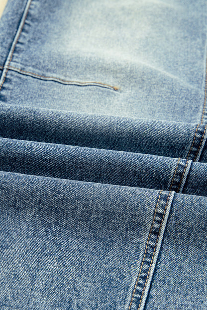 Vintage washed seam shift jeans for women by Byzantium Bay, showing distressed denim with seam details and relaxed fit.