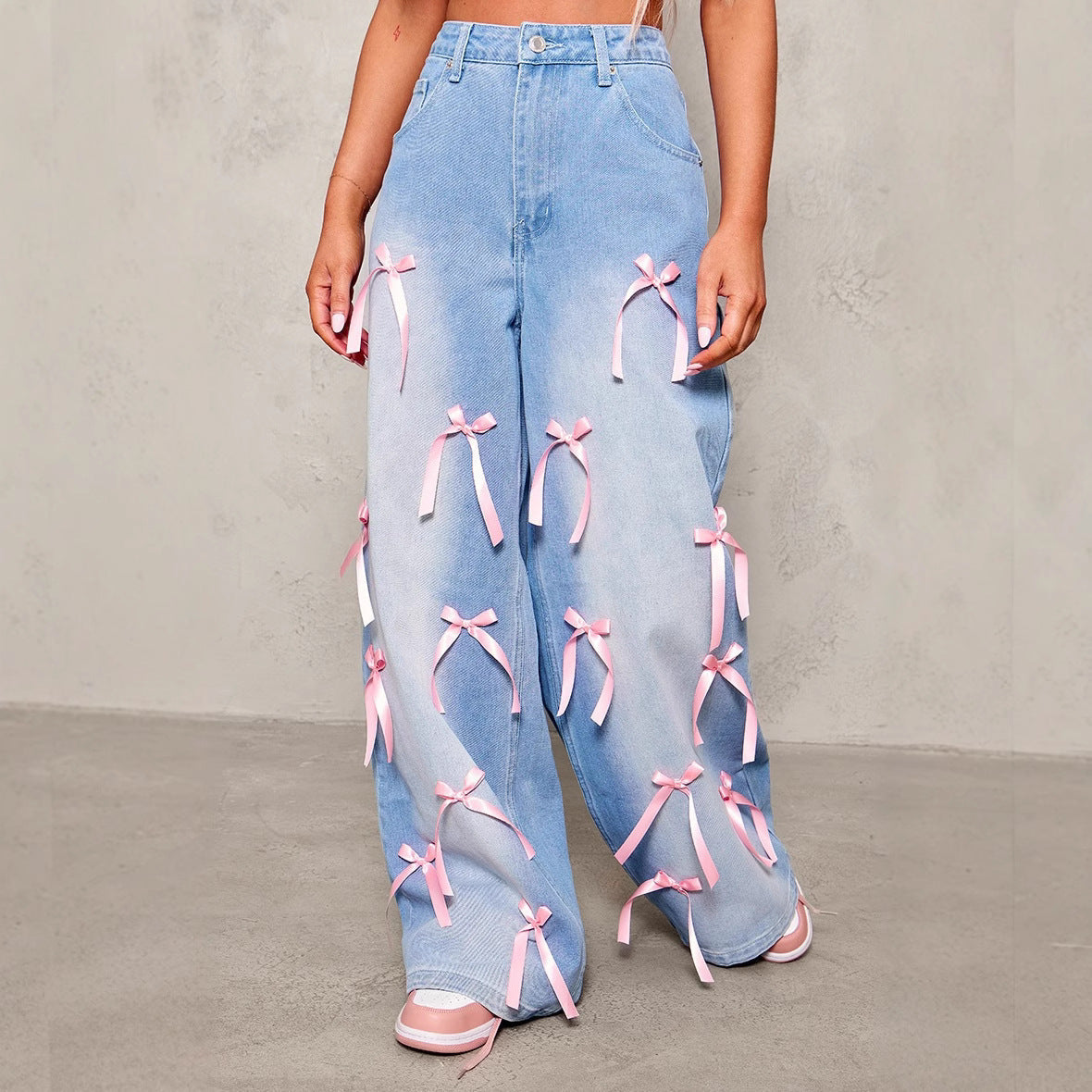 Carmine Juneberry Bow High Waist Wide Leg Jeans in Haute Edition, featuring a high waist, wide legs, and bow detail in denim.