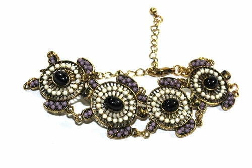 Colorful bead drop turtle bracelet by Silver Hestia featuring vibrant beads and a turtle charm, stylish and handcrafted jewelry.
