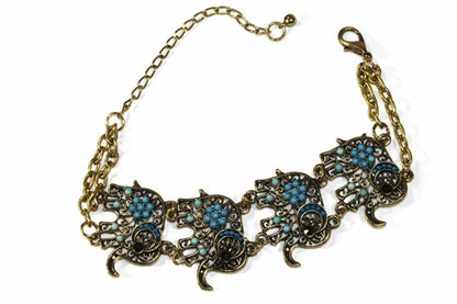 Colorful bead drop elephant bracelet by Silver Hestia featuring vibrant beads and a detailed elephant charm, handmade jewelry accessory.