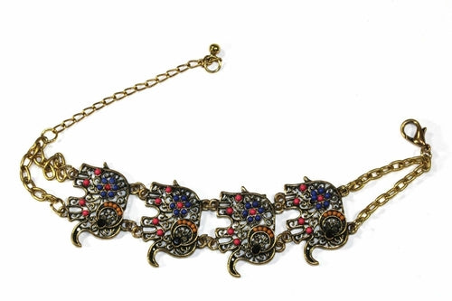 Colorful bead drop elephant bracelet by Silver Hestia featuring vibrant beads and a charming elephant charm on a flexible band.