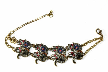 Colorful bead drop elephant bracelet by Silver Hestia featuring vibrant beads and a charming elephant charm on a flexible band.