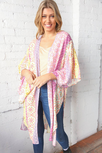 Multicolor boho ethnic patchwork open kimono for women by Ochre Ismene, featuring vibrant patterns and flowing fabric.