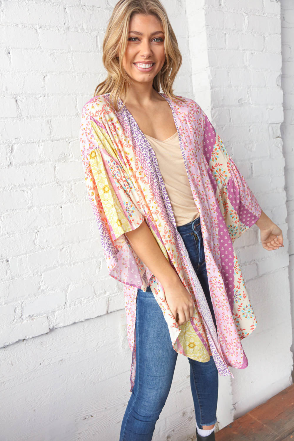 Multicolor boho ethnic patchwork open kimono for women by Ochre Ismene, featuring vibrant patterns and flowing fabric.
