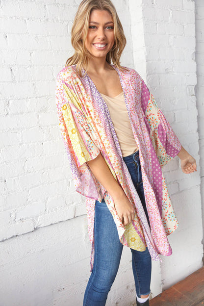 Multicolor boho ethnic patchwork open kimono for women by Ochre Ismene, featuring vibrant patterns and flowing fabric.