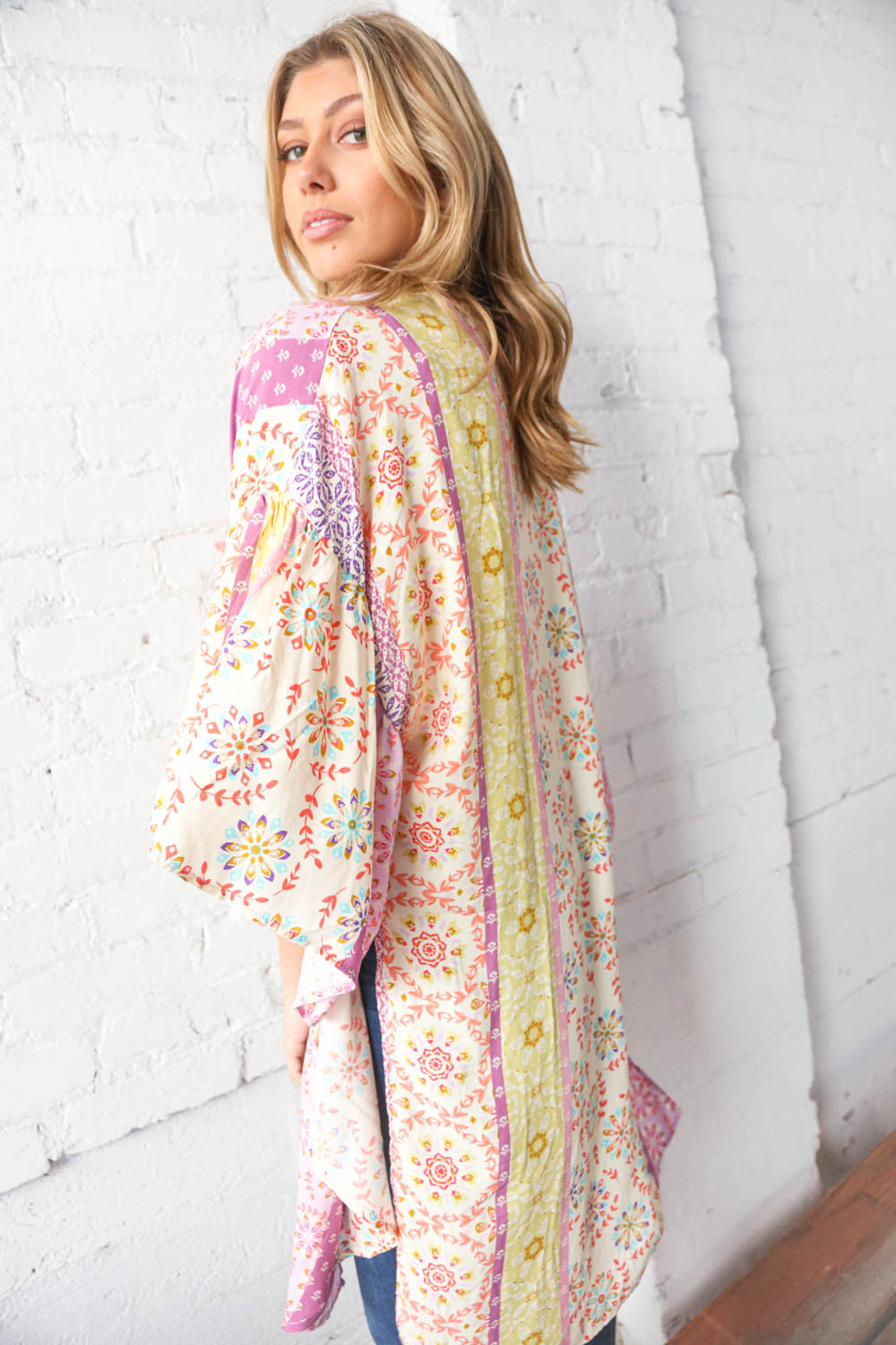 Multicolor boho ethnic patchwork open kimono for women by Ochre Ismene, featuring vibrant patterns and lightweight fabric.