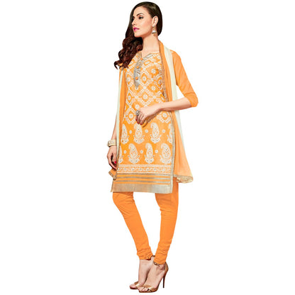 Orange Glaze Cotton Fabric dress material for women from Ivory Cassiopeia, showcasing smooth texture and vibrant color.