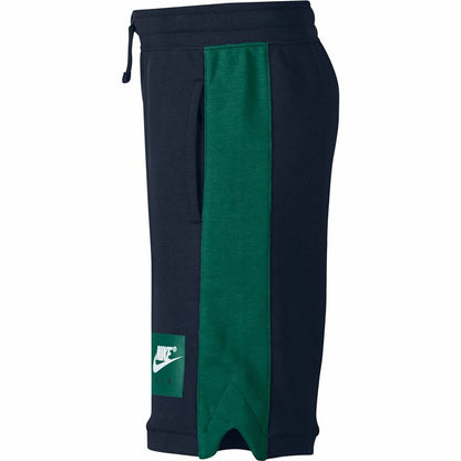 Black Nike children’s sports shorts with elastic waistband and Nike logo, designed for kids&