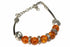 Amber Glow Resin Bracelet from Silver Hestia featuring warm amber-colored resin beads on a durable bracelet.