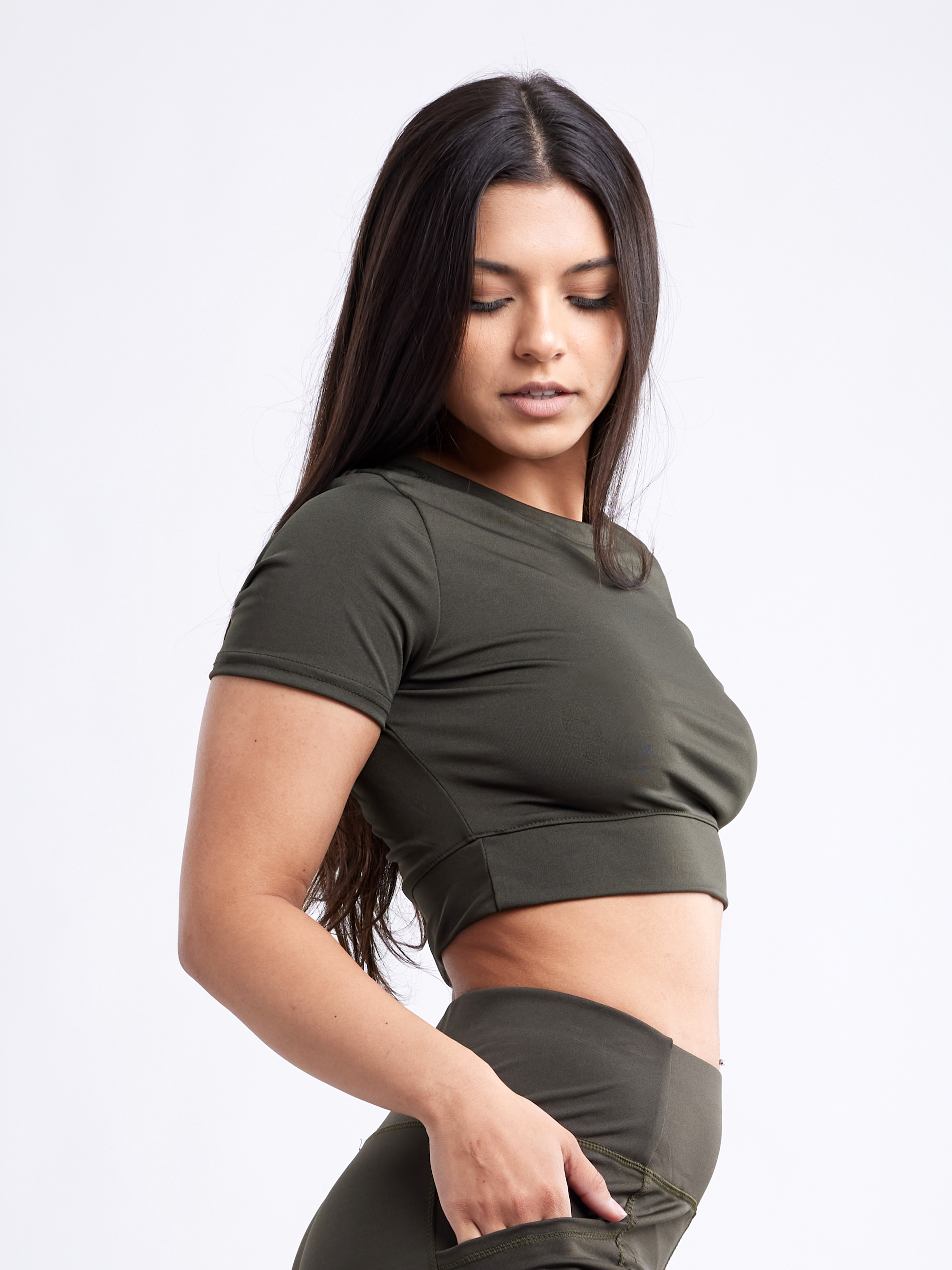 Sky Iapetus JupiterGear short-sleeve crop top, activewear, in a stylish design, shown laid flat with vibrant colors.