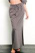 Brushed organic hemp side slit maxi skirt by Jade Icarus featuring a flowy silhouette and natural earthy tones.