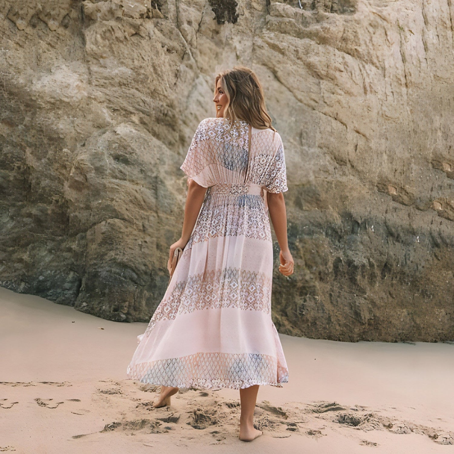 Women’s spring printed dress by Carmine Juneberry featuring a stylish floral pattern and lightweight fabric.