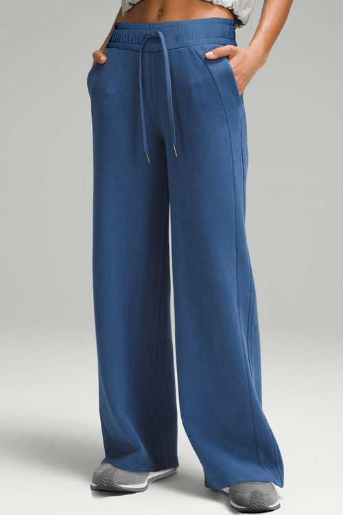 Carmine Juneberry sail blue high waist wide leg sweatpants with drawstring, pockets, and comfortable fabric.