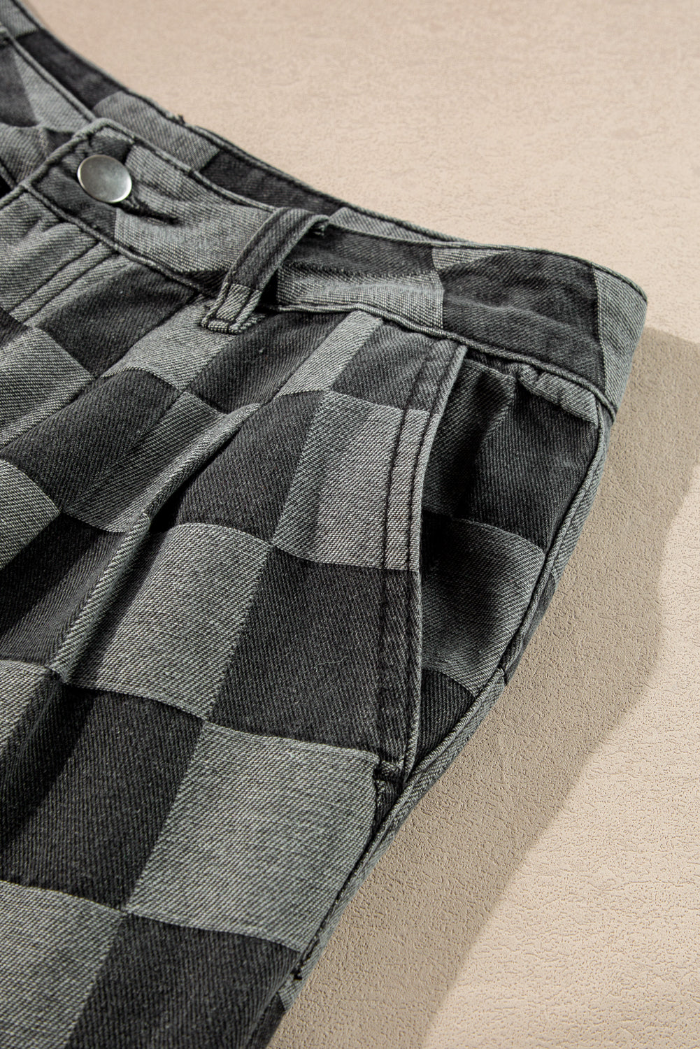 Dark grey checkered denim wide leg jeans for women by Ruby Styx, showcasing the relaxed fit and stylish pattern.