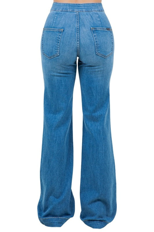 Harley Wide Leg Jeans by Jade Icarus in medium blue with 32-inch inseam, featuring a relaxed fit and classic denim style.