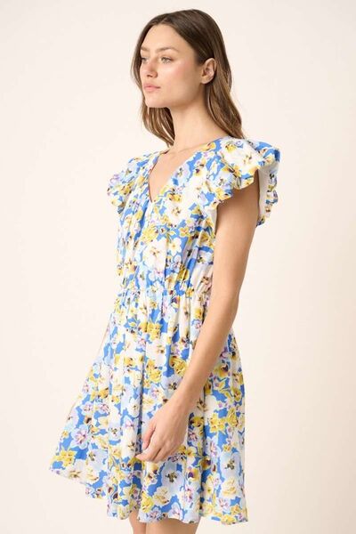 Jade Icarus Mittoshop floral V-neck cap sleeve mini dress for women with a colorful floral pattern and fitted silhouette.