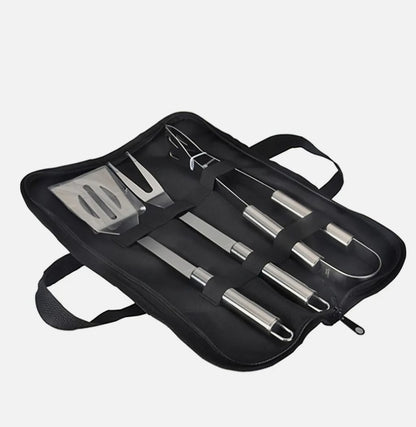 Three stainless steel BBQ grill utensils set including tongs, spatula, and fork for outdoor cooking, by Yellow Pandora.