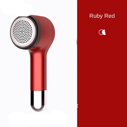 Maroon Asteria Hair Ball Trimmer with USB charging, compact handheld device for removing lint and fuzz from clothing and fabrics.
