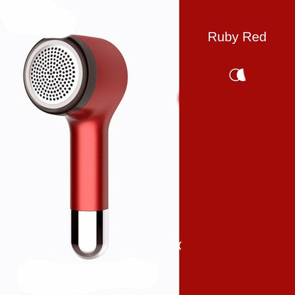 Maroon Asteria Hair Ball Trimmer with USB charging, compact handheld device for removing lint and fuzz from clothing and upholstery.
