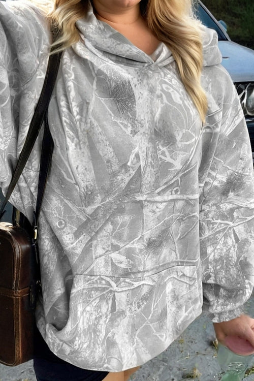 Plus size camo woodland oversize hoodie by Byzantium Bay, cozy sweater with camouflage pattern and relaxed fit.