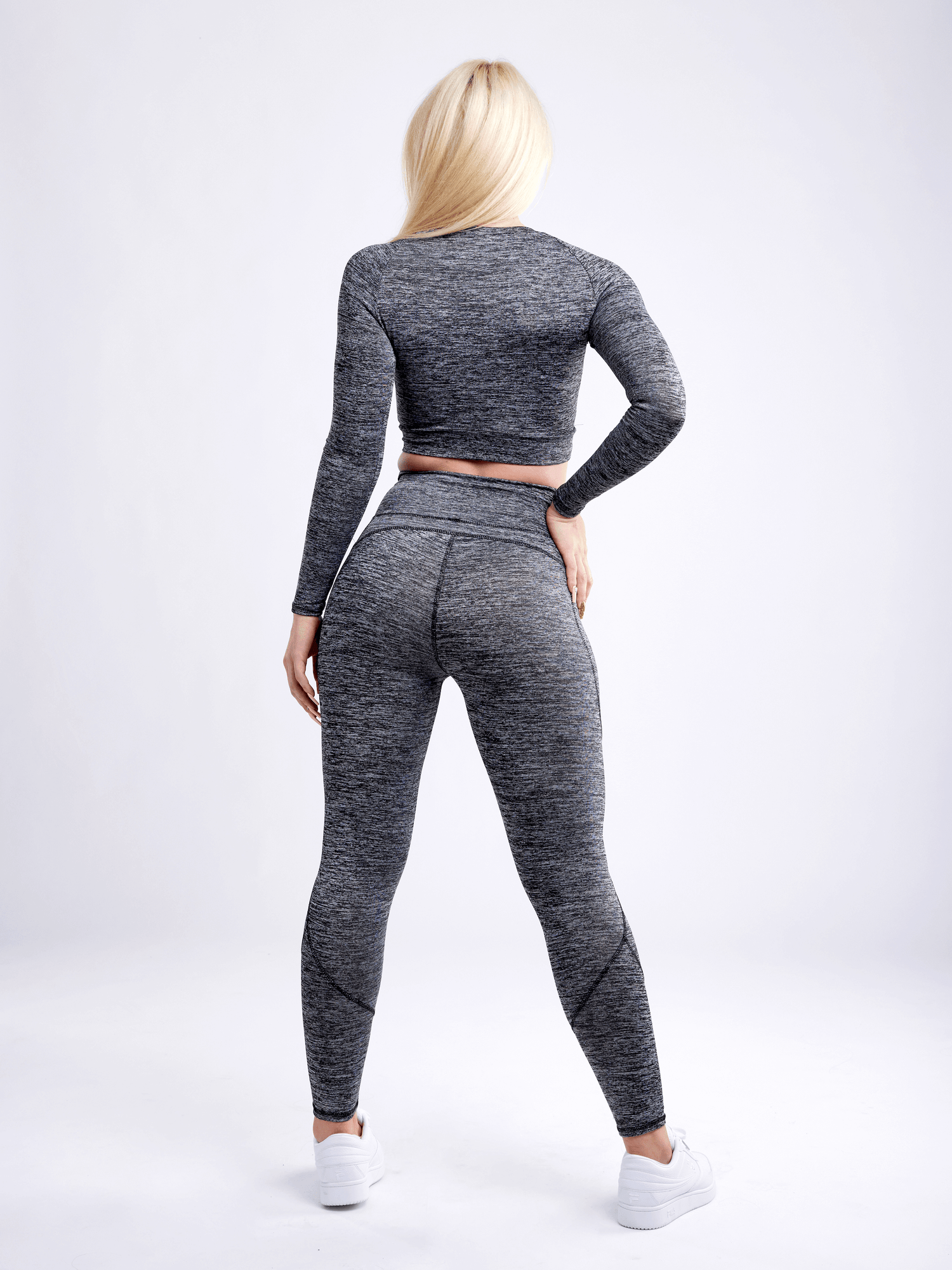 Black Lavender JupiterGear long-sleeve crop top, activewear top with fitted design and thumbholes, shown on a white background.