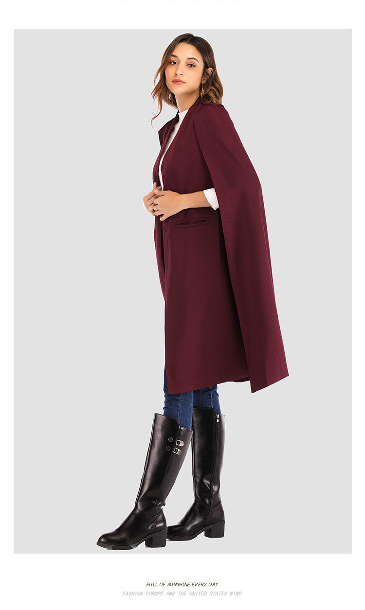 Urban Cloak Cape Coat by Carmine Juneberry, stylish black jacket with flowing cape design, perfect for modern outerwear.
