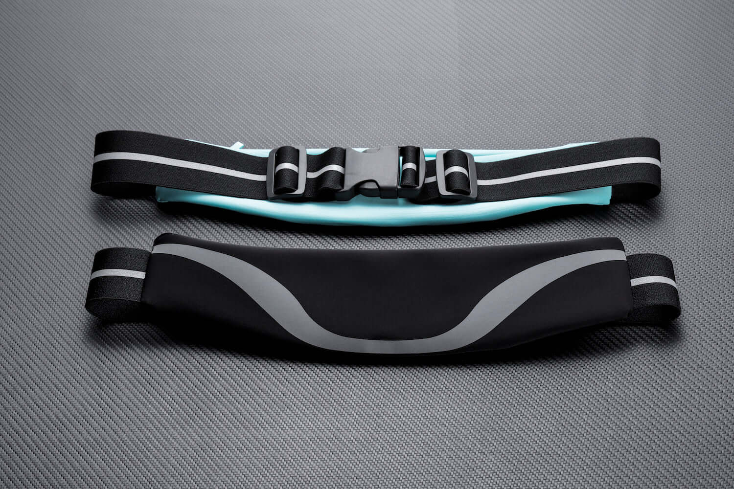Black Lavender water-resistant sport waist pack with reflective strip, ideal for running and outdoor activities.