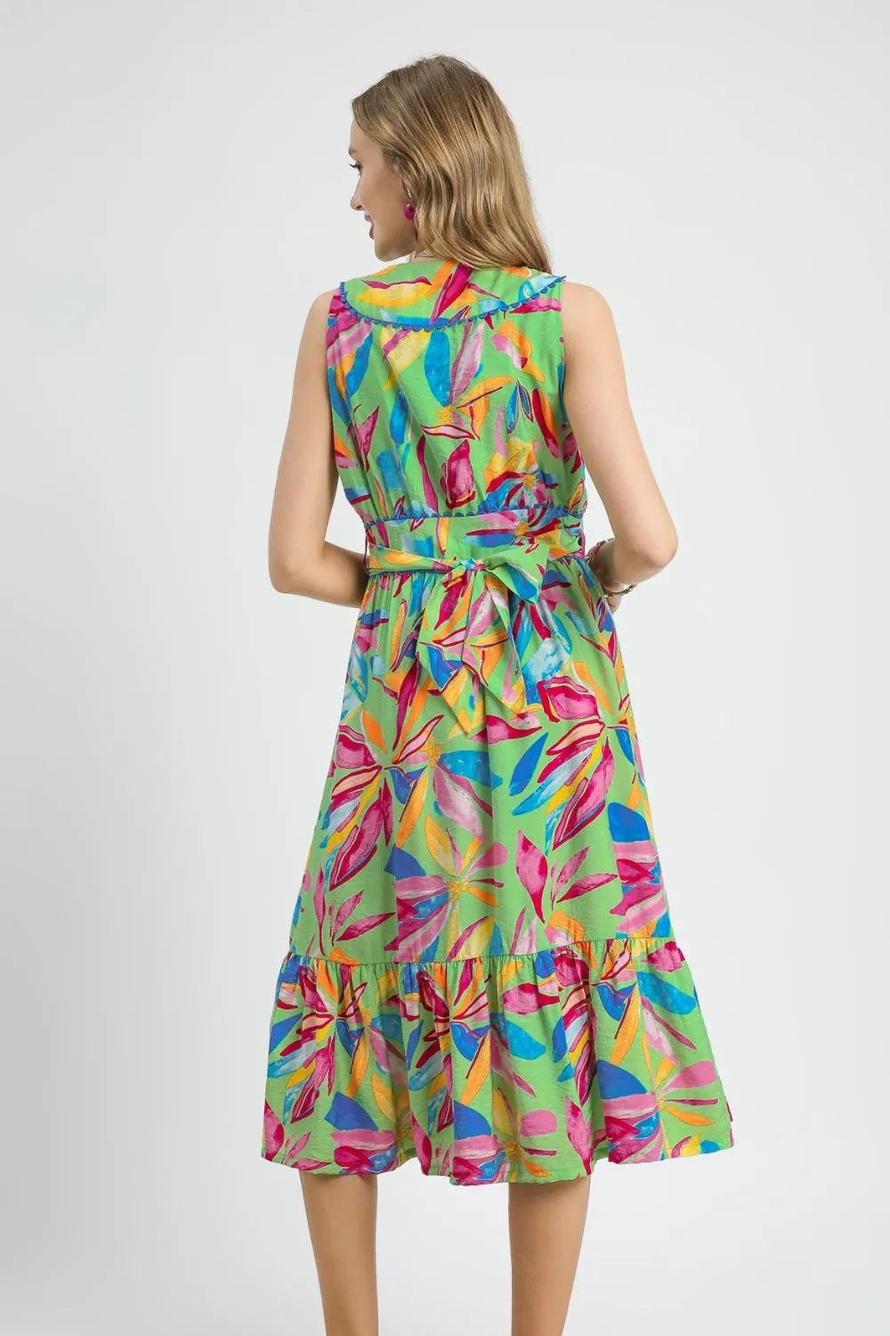 Pear Daisy Umgee ruffled hem printed sleeveless midi dress, showcasing a flowy floral design and stylish ruffle details.